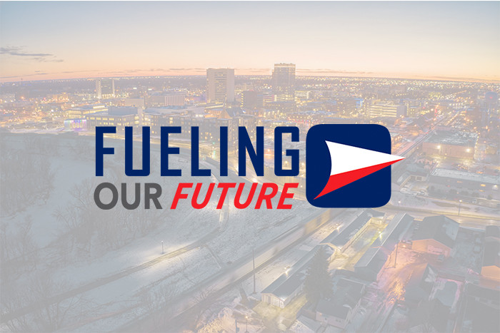 Fueling Our Future logo over a bright evening skyline of Fargo, Moorhead and West Fargo
