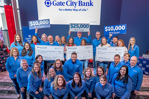 Gate City Bank team celebrating with Giving Hearts Day winners from Haven, Best Friends Mentoring Program and Ronald McDonald House Charities of the Red River Valley